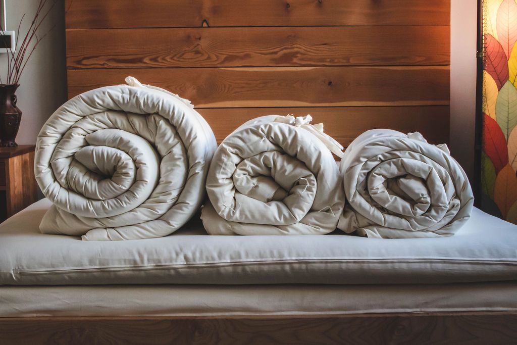 Wool comforter weights compared, rolled