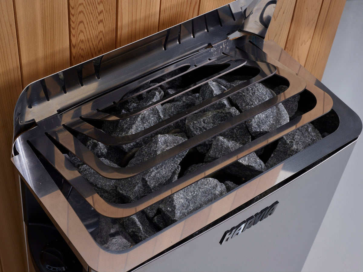 Harvia 6 kW traditional sauna stove with built-in controls, fitted in the Soria cabin