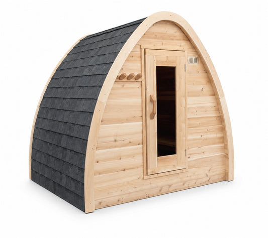 Canadian Timber MiniPOD Sauna on a white background, three-quarter view showing the arched cedar body, shingled end and glass door