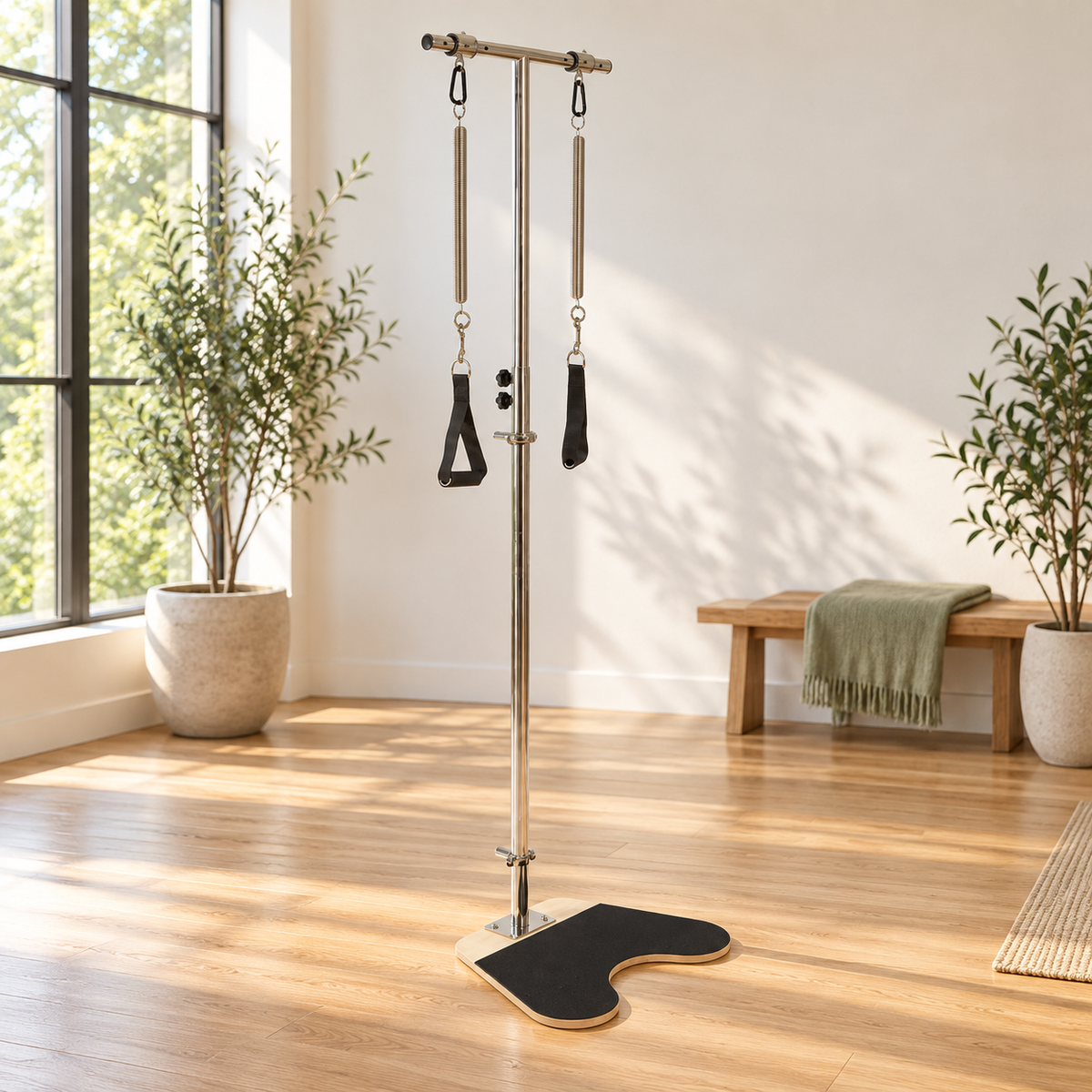 Elina Pilates Ped and Pull standing on an oak floor in a bright Pilates studio