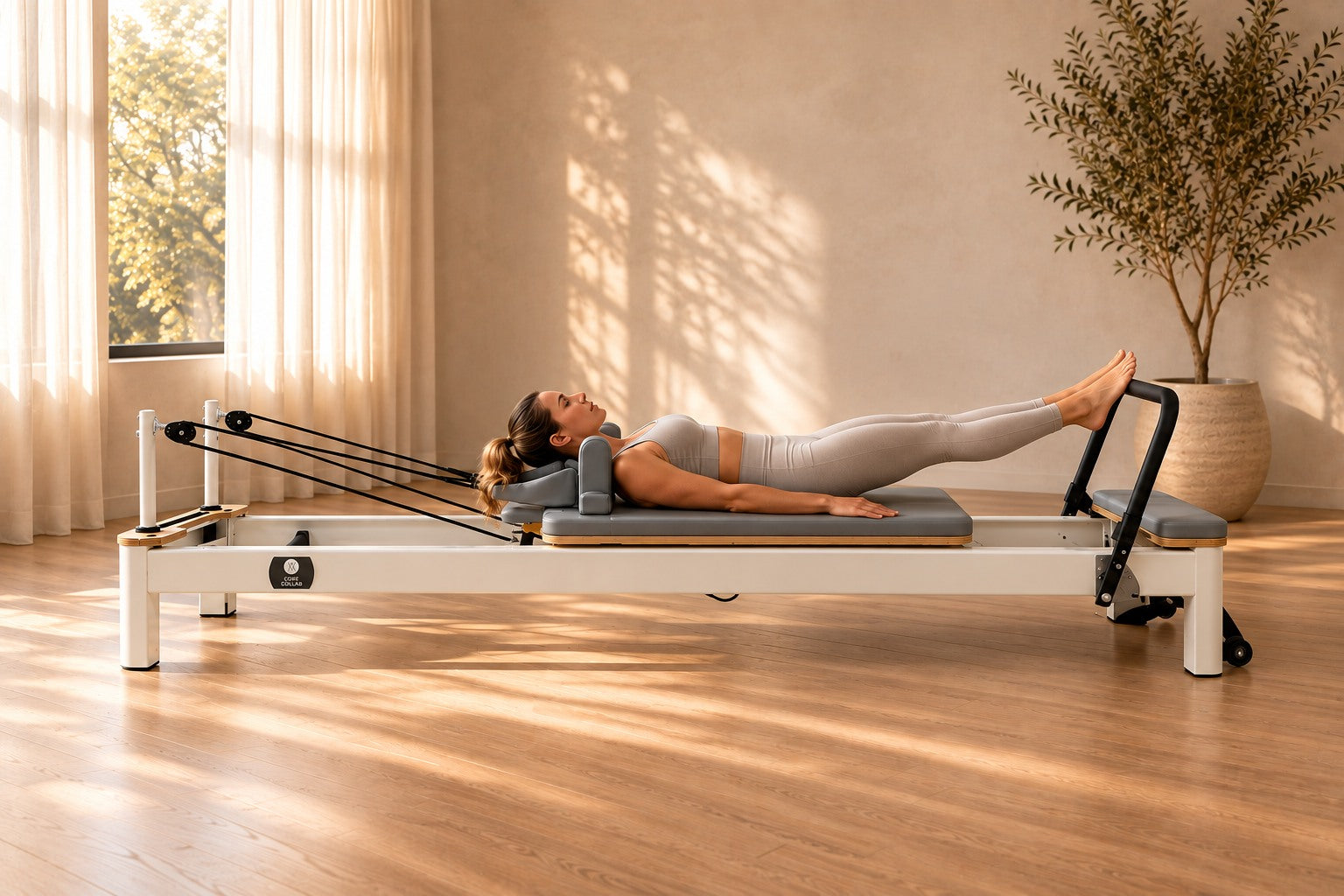 Pilates reformer in use in a sunlit home studio